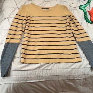 The limited sweater in M, fits tighter